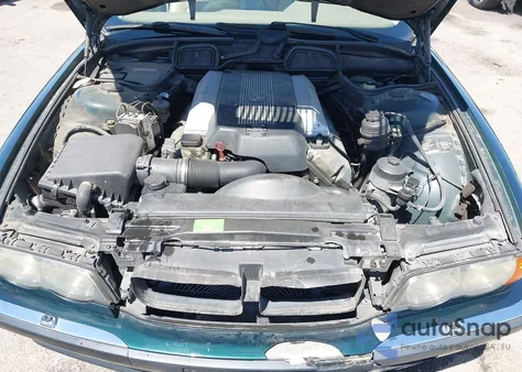 1999 BMW 740Ia из США, поврежденный, VIN WBAGG8335XDN73992